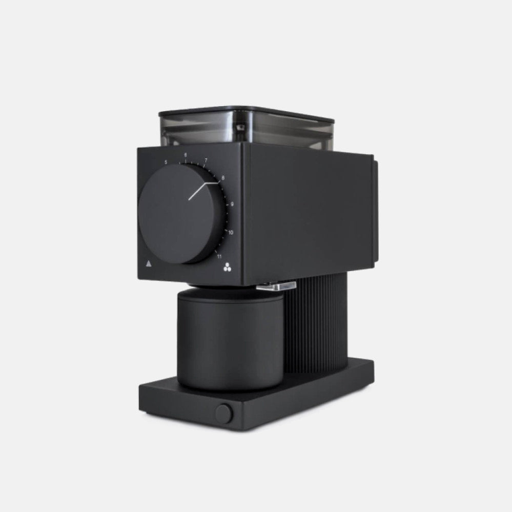 Fellow Ode Gen 2 coffee grinder in matte black with a large front dial and top hopper.