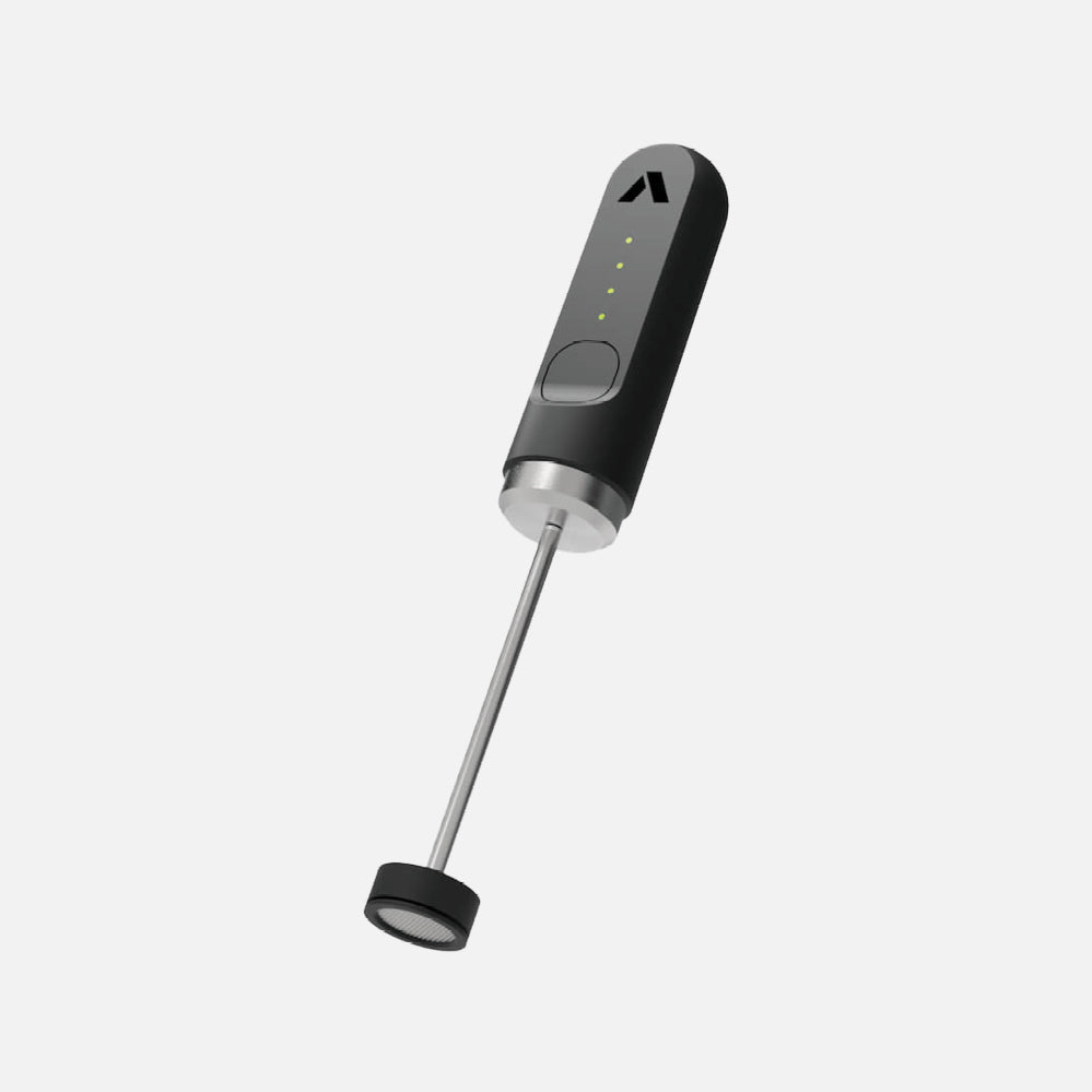 Nanofoam Milk Frother by Subminimal handheld frother with slim black body and silver rod for cafe quality milk froth.