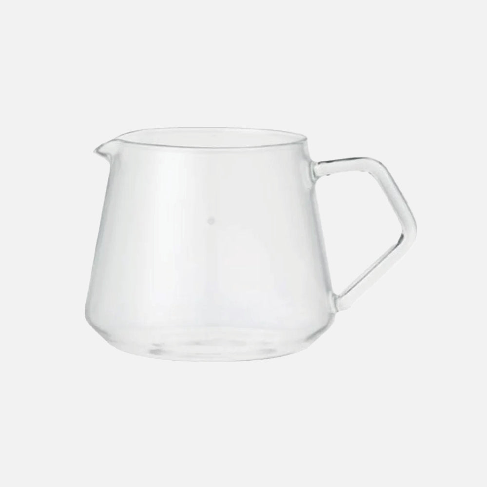 Clear glass Slow Style coffee server with curved spout for pour over brewing.