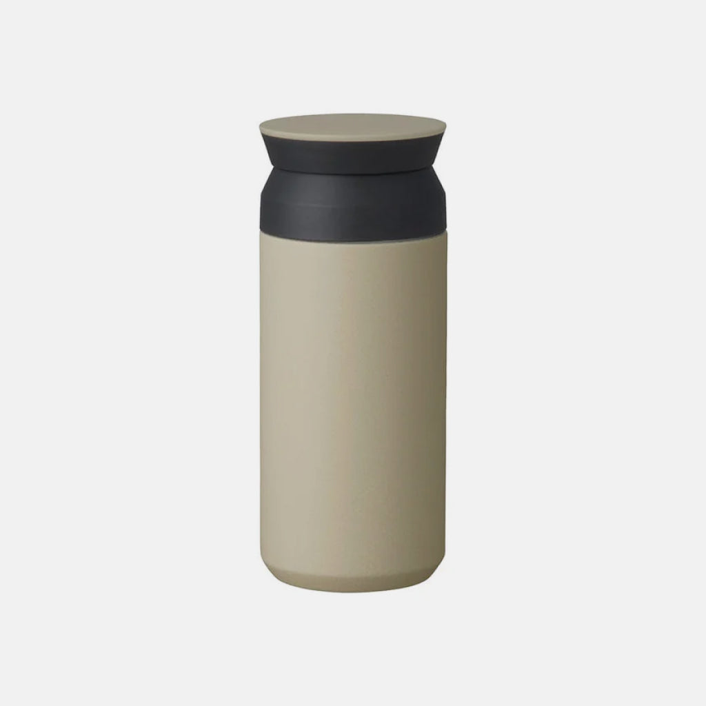 Kinto Travel Tumbler with 350ml capacity in Sand Beige with a spill-free dark lid.