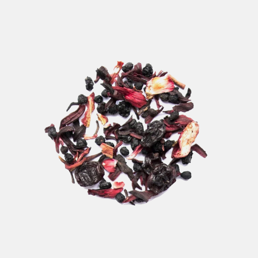 Loose Organic Elderberry Hibiscus tea leaves with burgundy petals and dark berries